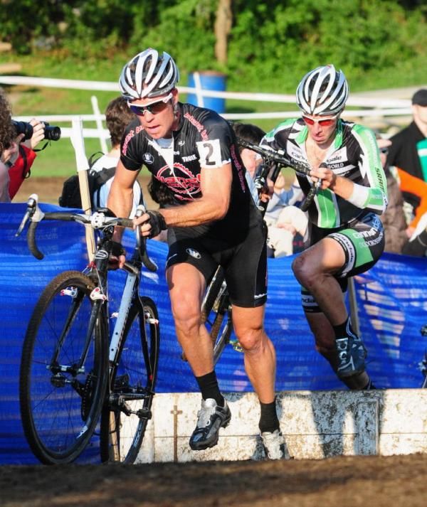 Jonathan Page (Planet Bike) leads Jeremy Powers (Cannondale/cyclocrossworld.com) over the barriers.
