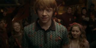 Ron celebrating a huge Quidditch victory