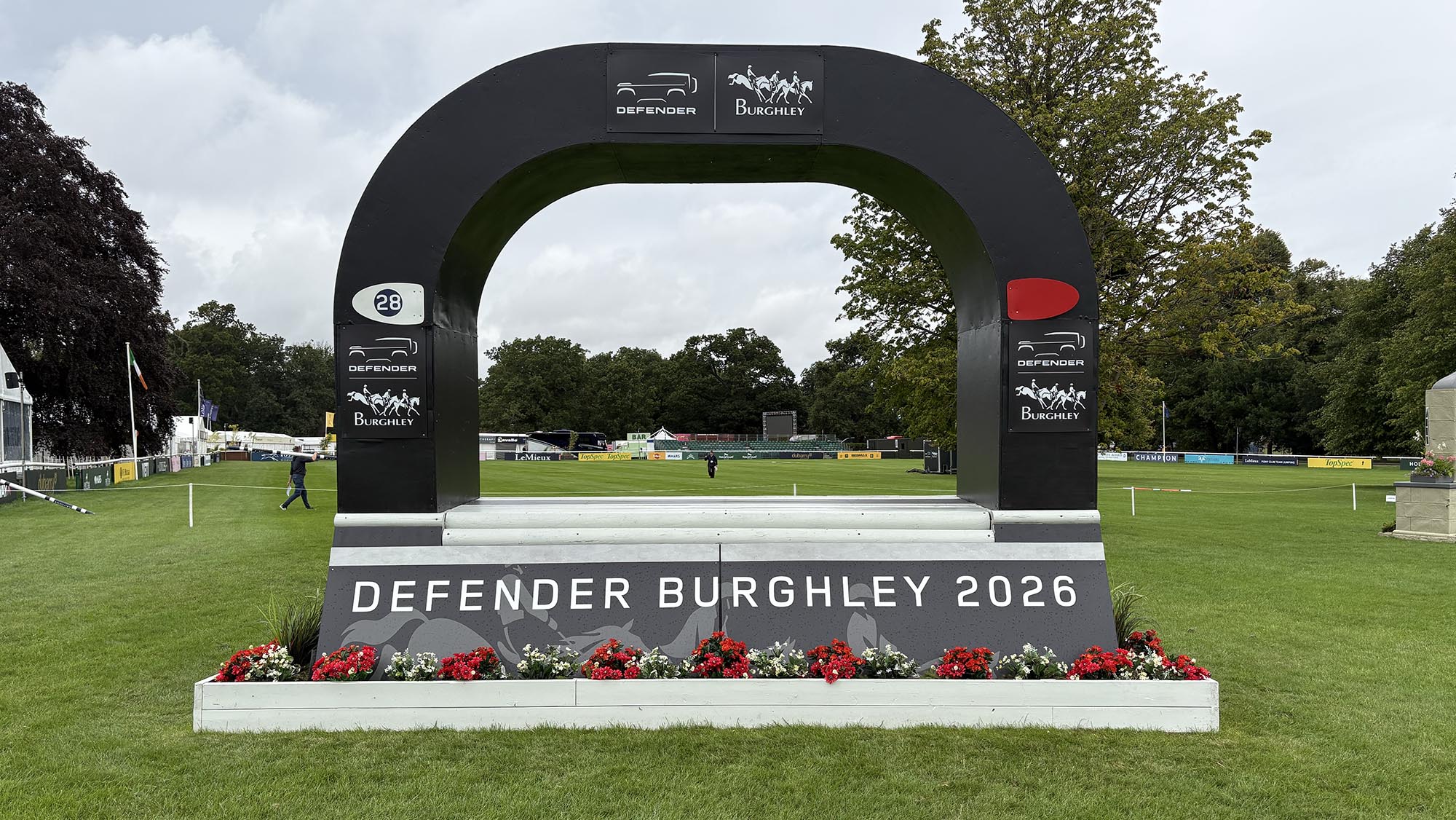 Final fence with a roof over it, decorated for Defender, on the Burghley cross-country course 2026