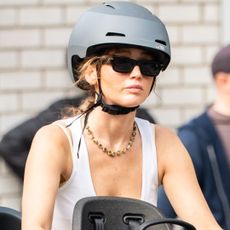 Jennifer Lawrence accessorized her denim biking outfit with a studded belt, a leading trend for Spring 2027