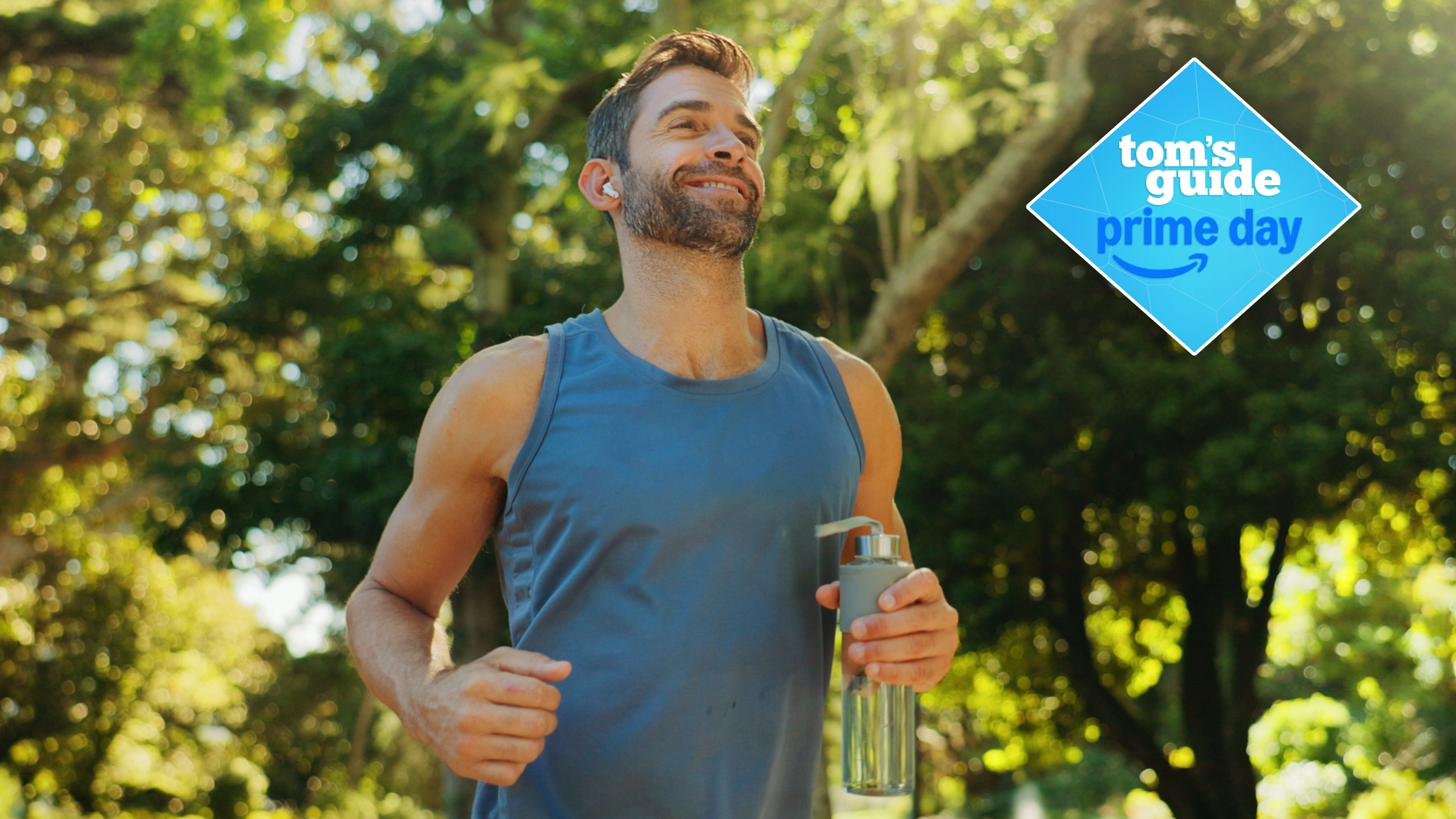 Man running outside with headphones in the sun holding a water bottle