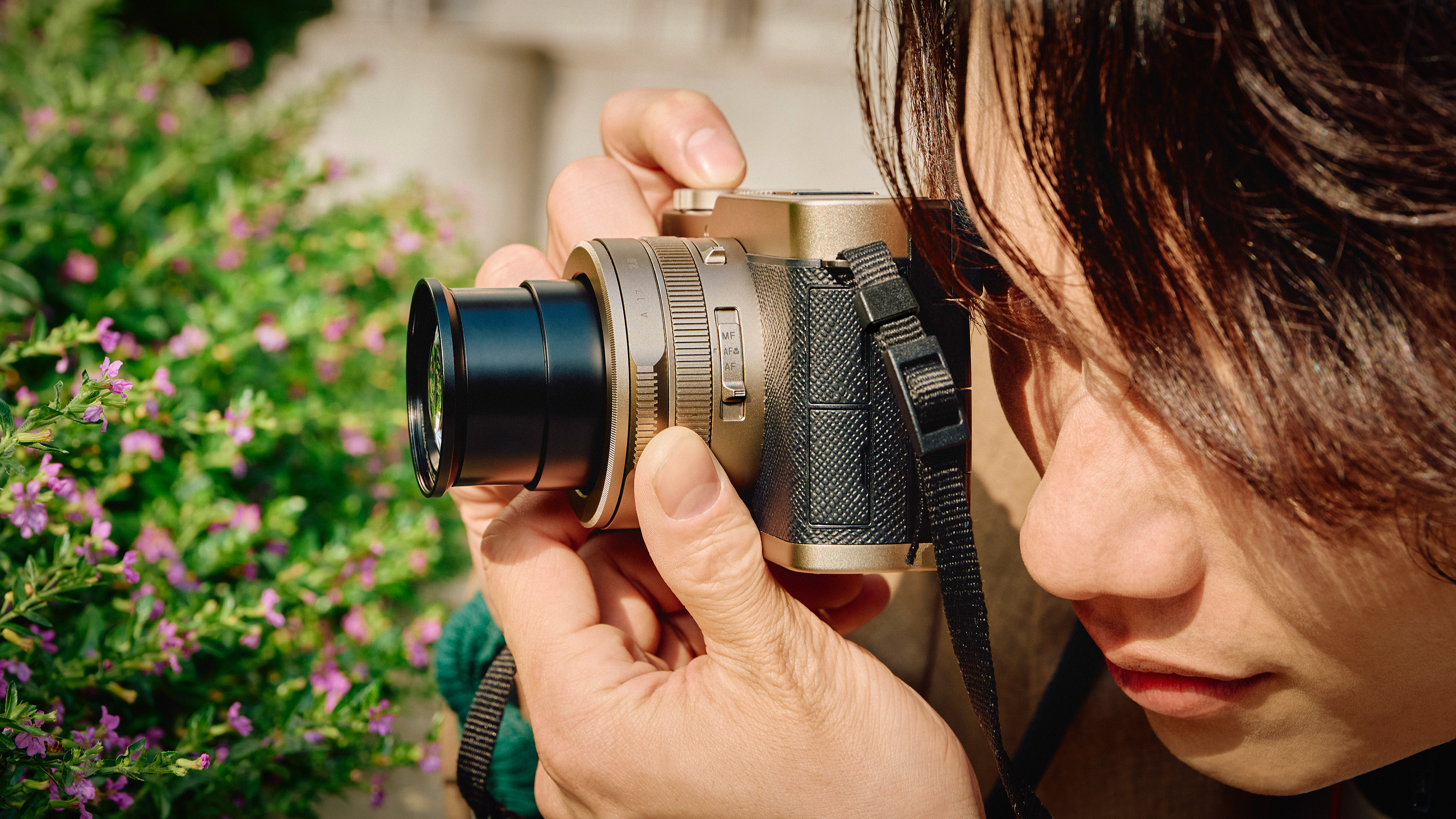 Panasonic Lumix L10 being used by a photographer outdoors