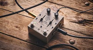 Walrus Audio Xero Polylooper: the dual-slider and footswitch looper is photogaphed against a wooden floor.
