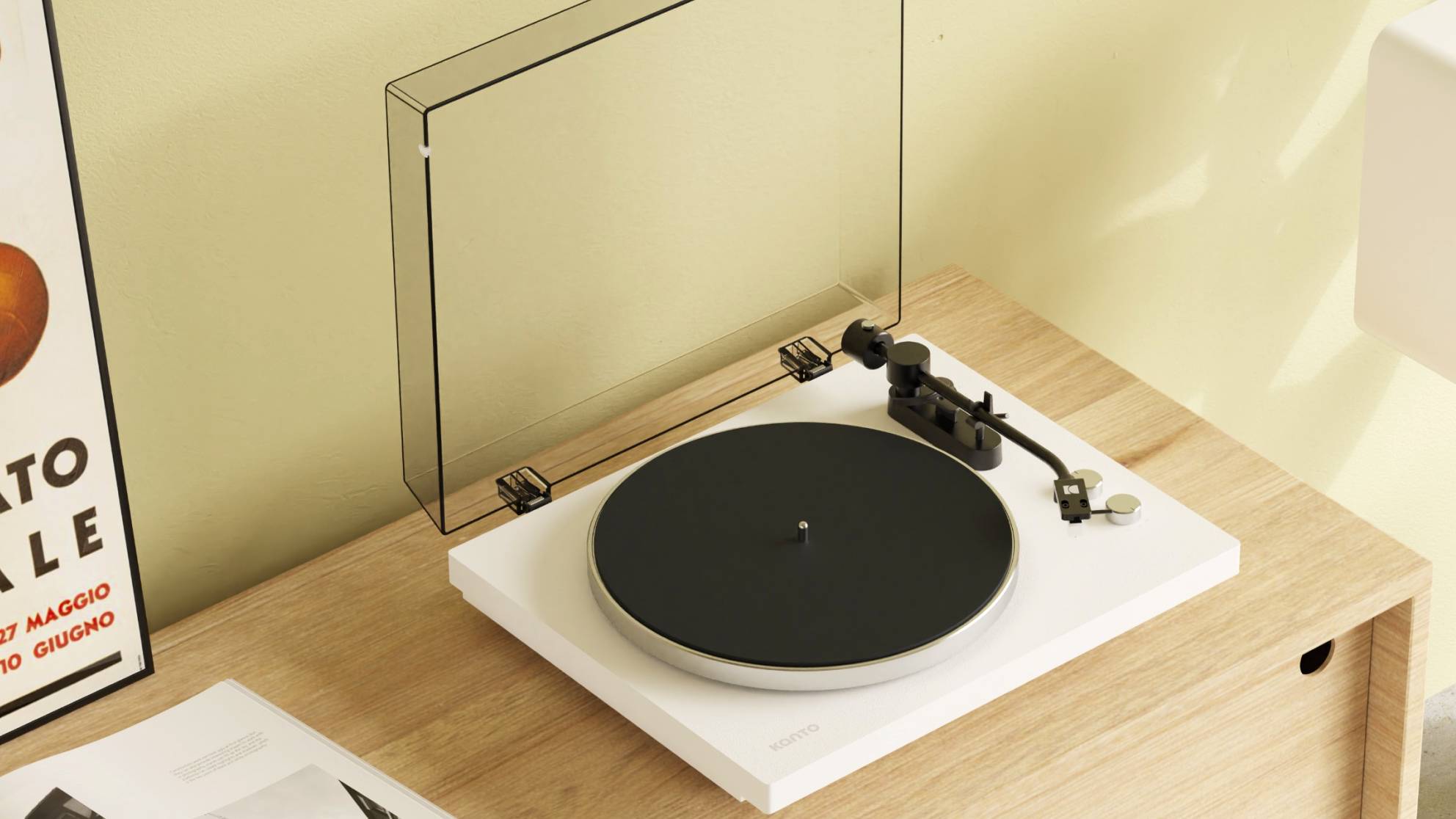 The Kanto Audio Obi3 Gen 2 model on a wooden drawer.