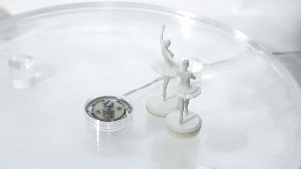 3D-printed hairs on the bottoms of these figures control their movement