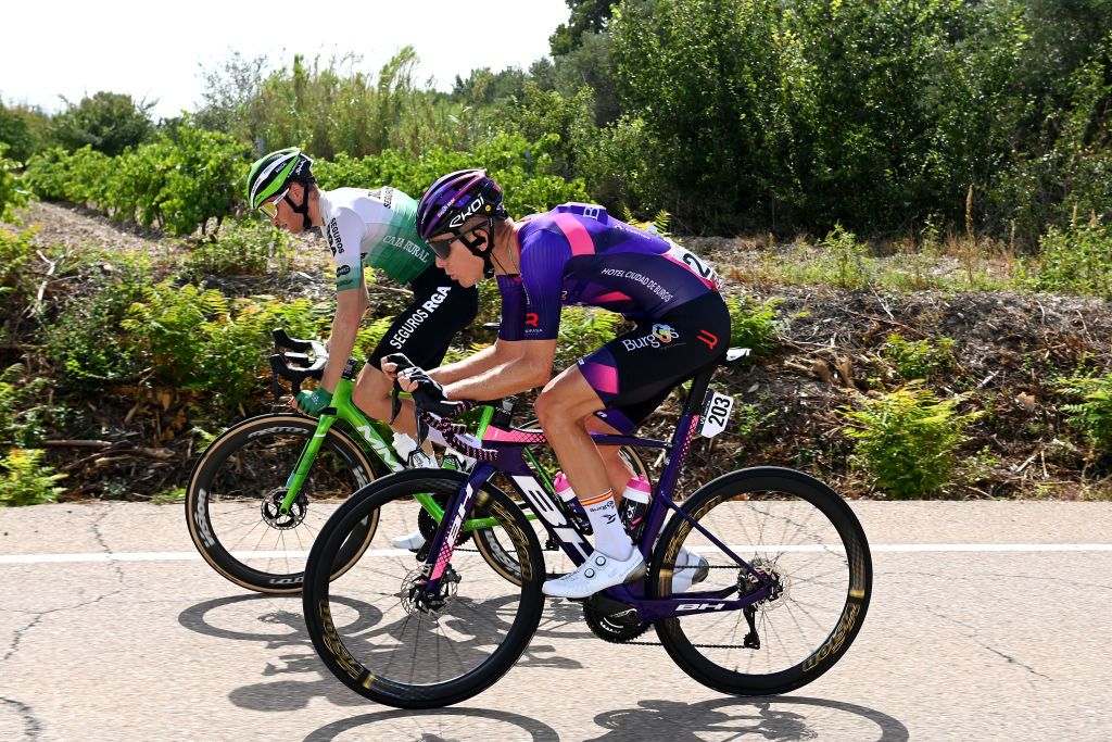 ZARAGOZA SPAIN SEPTEMBER 07 LR Abel Balderstone of Spain and Team Caja Rural Seguros RGA and Jetse Bol of The Netherlands and Team BurgosBH compete in the breakaway during the 78th Tour of Spain 2023 Stage 12 a 1506km from lvega to Zaragoza UCIWT on September 07 2023 in Zaragoza Spain Photo by Tim de WaeleGetty Images