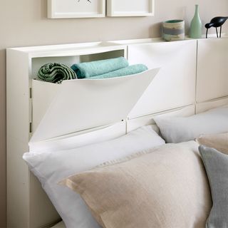 White headboard with white bed