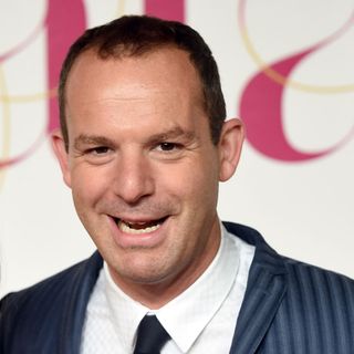Martin Lewis with blue suit and white shirt