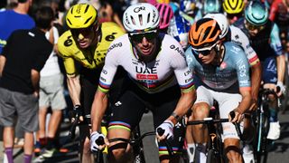Brandon McNulty wearing the rainbow jersey during the 2026 Giro dell'Emilia