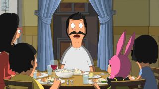 Bob freaking out in front of his family at the dinner table in The Bob's Burgers Movie.