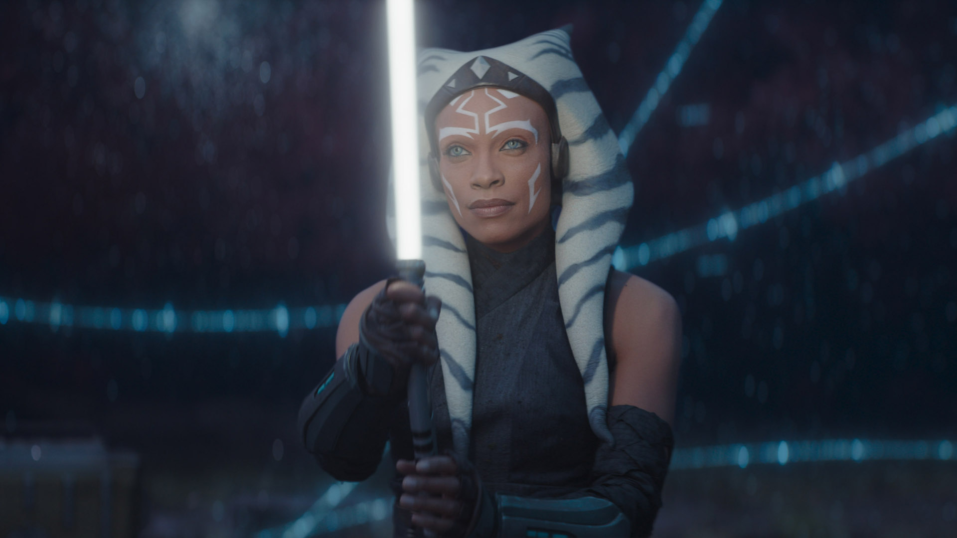 Ahsoka Tano holds up one of her lightsabers in her standalone Star Wars TV show on Disney Plus