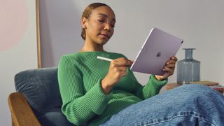 Apple iPad Air being used by lady with an Apple Pencil