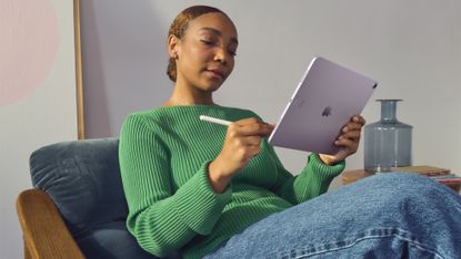 Apple iPad Air being used by lady with an Apple Pencil