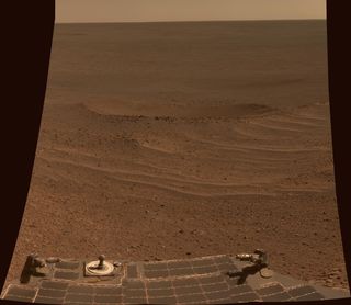 NASA's Mars Exploration Rover Opportunity shows a view of "Lunokhod Crater," lying south of Solander Point on the west rim of Endeavour Crater. This image was taken on April 24, 2014 and released on July 28.