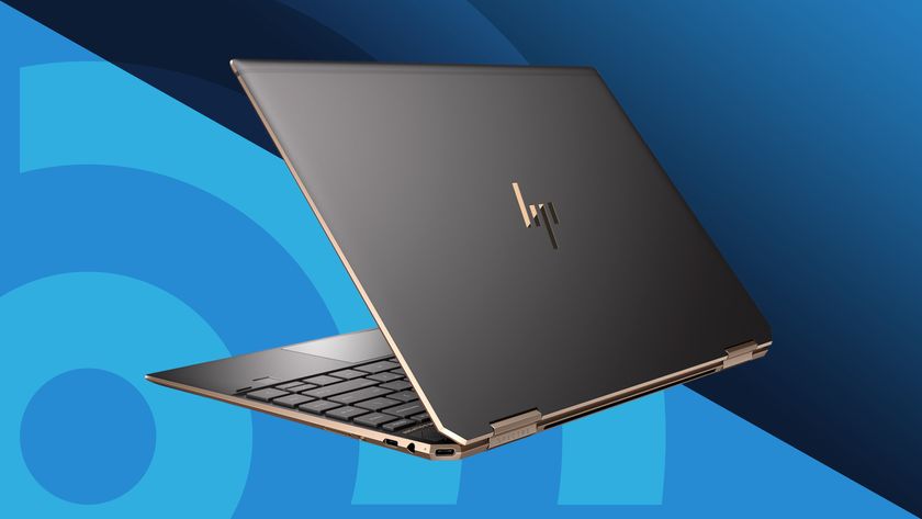 The HP Spectre x360 on a blue background with the TechRadar logo.