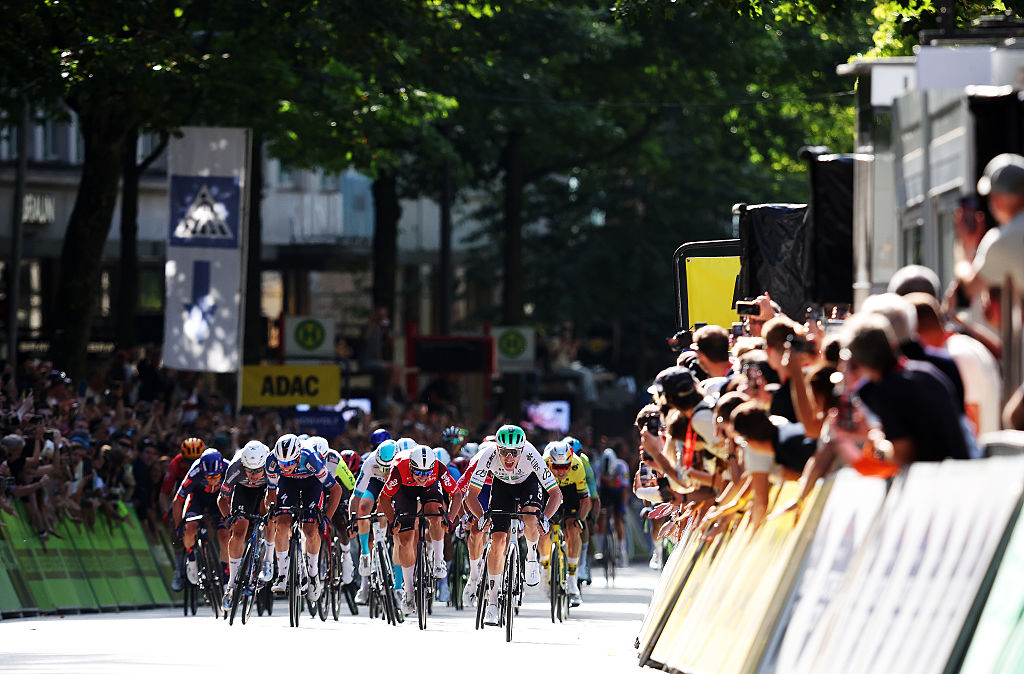HAMBURG, GERMANY - AUGUST 17: A general view of Rory Townsend of Ireland and Q36.5 Pro Cycling Team sprint at finish line to winner the race ahead of Arnaud De Lie of Belgium and Team Lotto, Jasper Philipsen of Belgium and Team Alpecin - Deceuninck and Paul Magnier of France and Team Soudal Quick-Step during the 28th Hamburg Cyclassics 2025 a 207.4km one day race from Buxtehude to Hamburg / #UCIWT / on August 17, 2025 in Hamburg, Germany. (Photo by Ronny Hartmann/Getty Images)