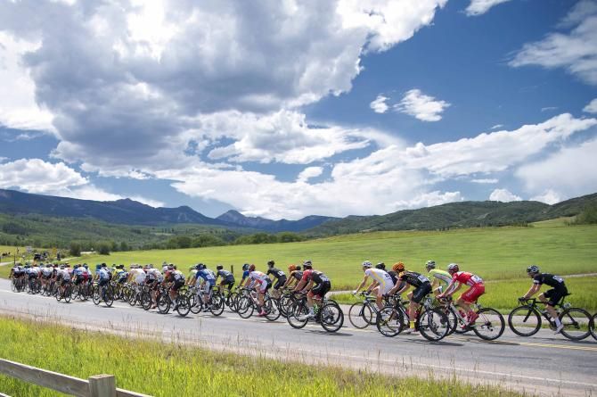 The peloton under blue skies
