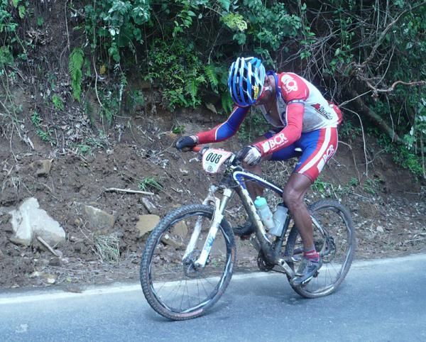 Past winner Federico Ramirez looks down at his soft, rear tire.