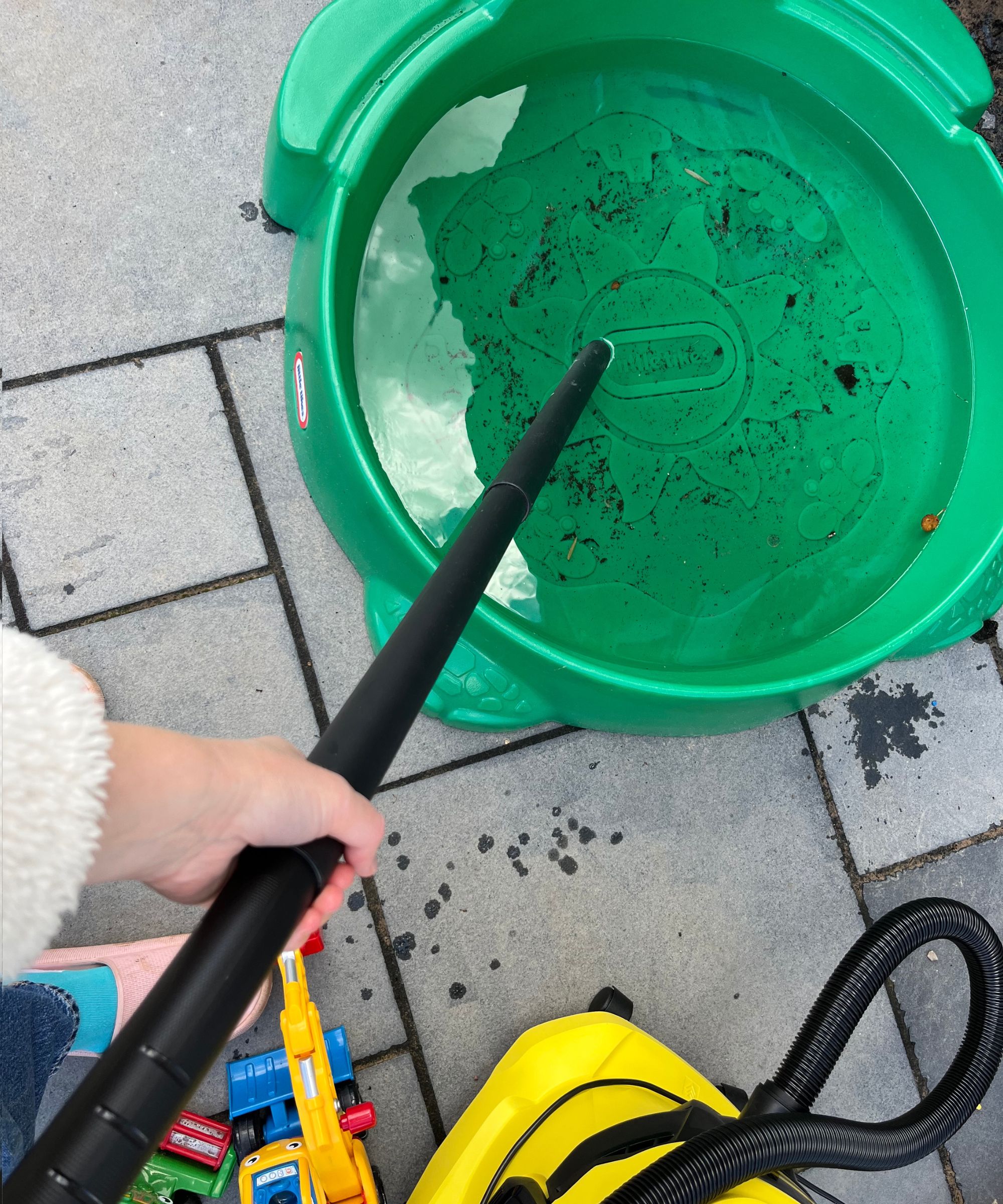 Karcher WD4 removing water from kids sandpit after rainfall