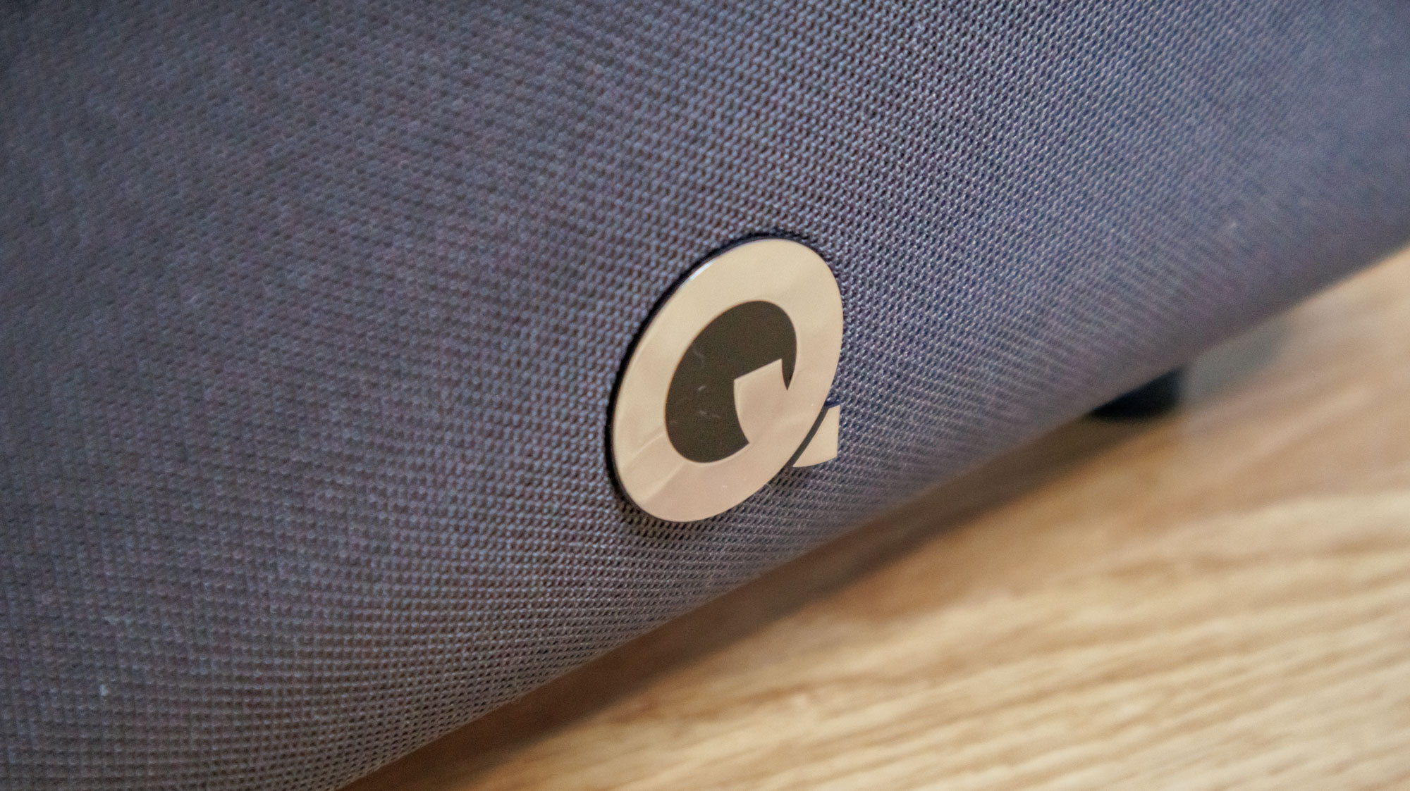 Qacoustics-sub80 closer closeup of the badge