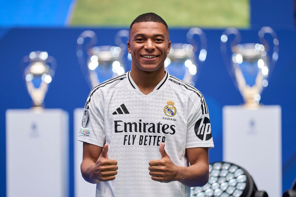 Real Madrid new signing, Kylian Mbappe is unveiled at Estadio Santiago Bernabeu on July 16, 2024 in Madrid, Spain (Photo by Diego Souto/Getty Images) Erling Haaland Manchester City