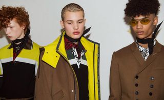 3 male models in brown & yellow clothing