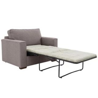 Grey chair bed with pull out mattress on legs
