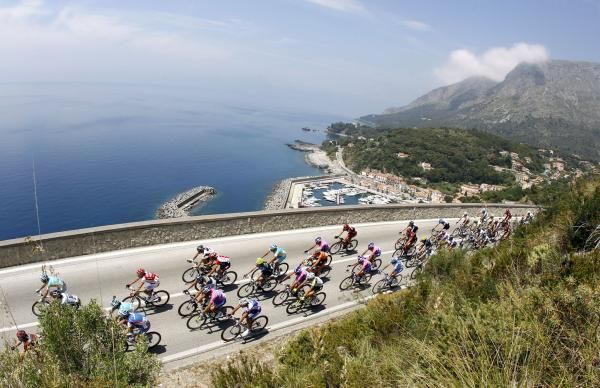 The peloton rode along the coast all day