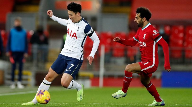 Heung-min Son of Tottenham challenges Liverpool&#039;s Mohamed Salah.