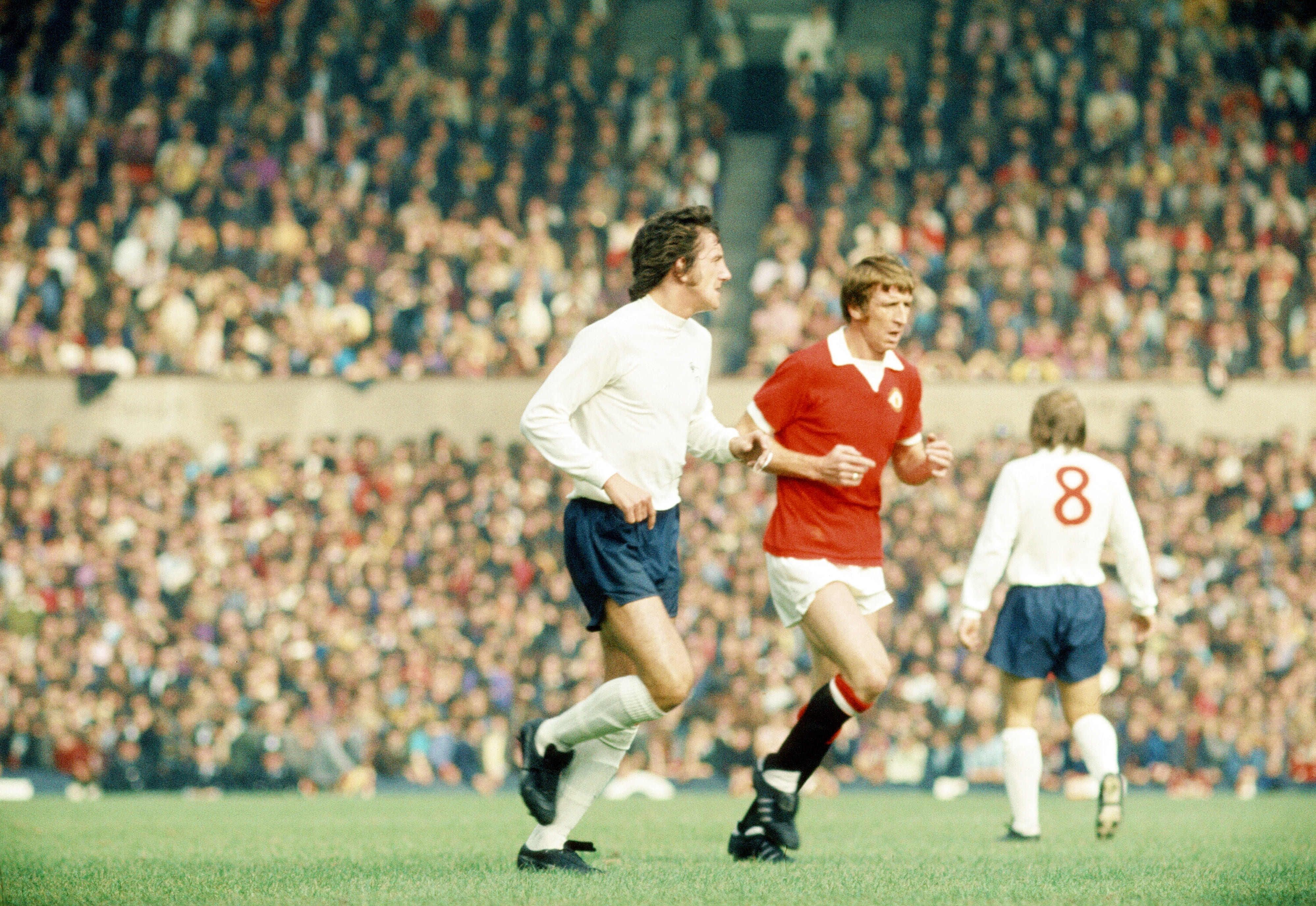 Wyn Davies (middle, in red) in action for Manchester United against Derby County in September 1972.