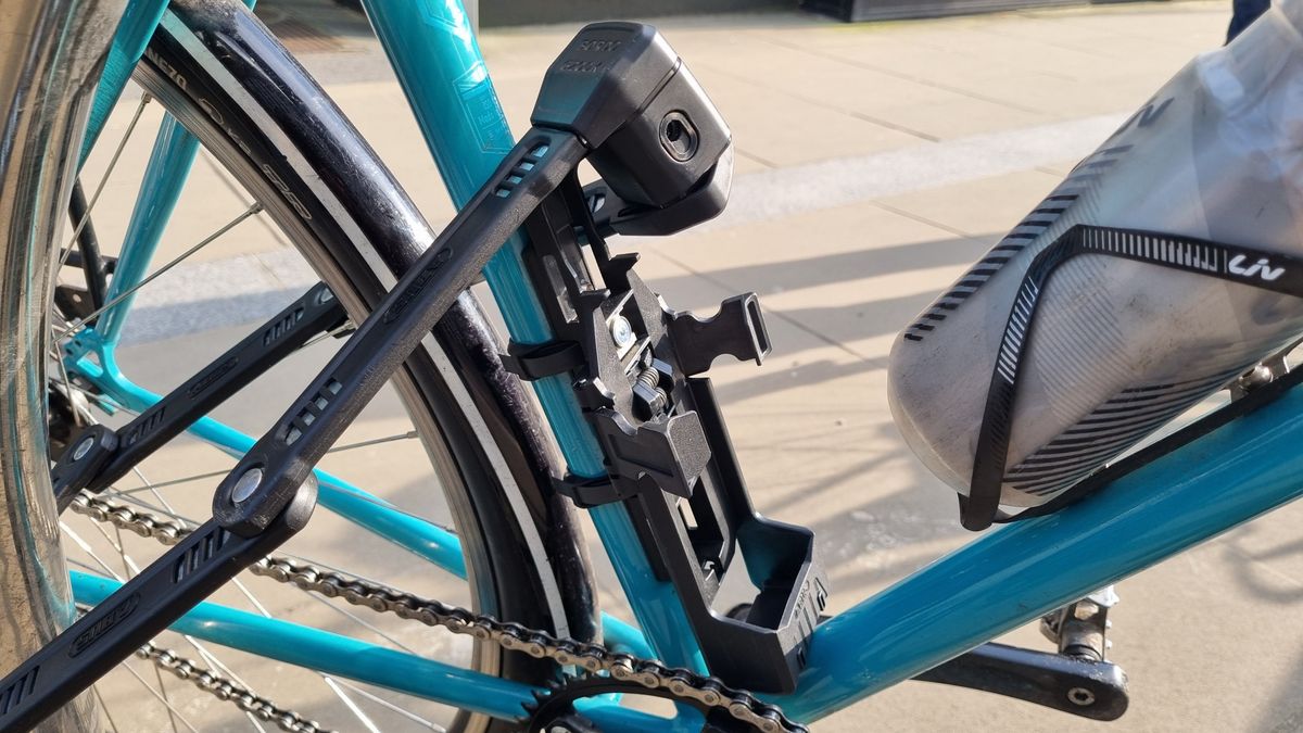 The bracket of the Abus Bordo 6200K lock, mounted to a bike