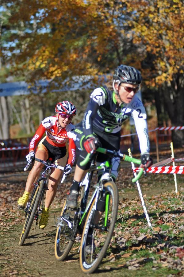 Maureen Bruno Roy (Bob's Red Mill p/b Seven Cycles) follows Sally Annis (crossresults.com/pedalpowercoaching.com) through a bend.