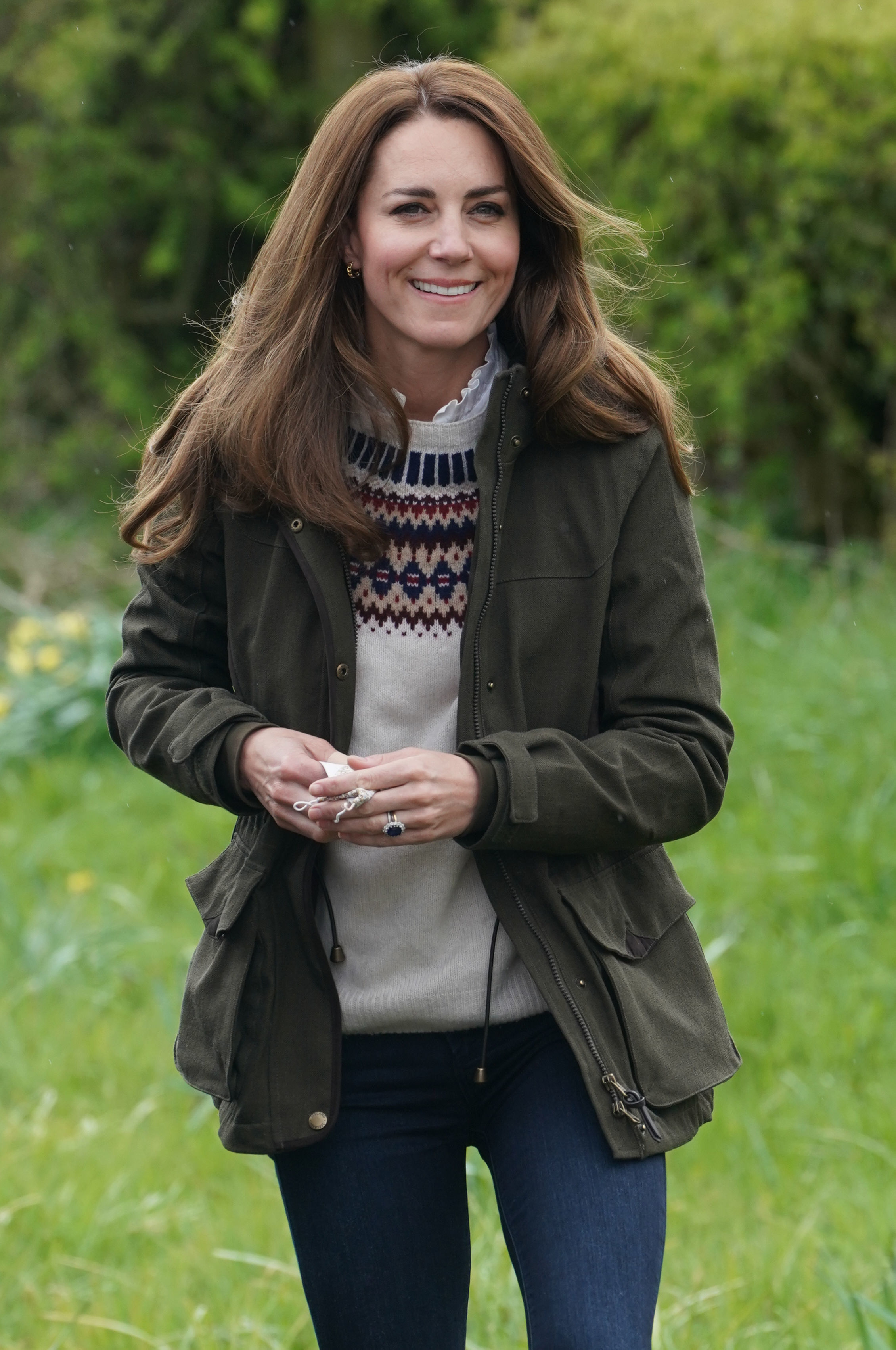 Princess Kate wearing a Barbour jacket in a field