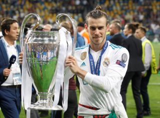Gareth Bale with the Champions League trophy after Real Madrid's win over Liverpool in 2018.