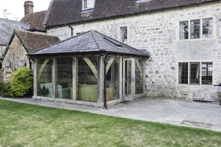 oak frame sunroom to listed house