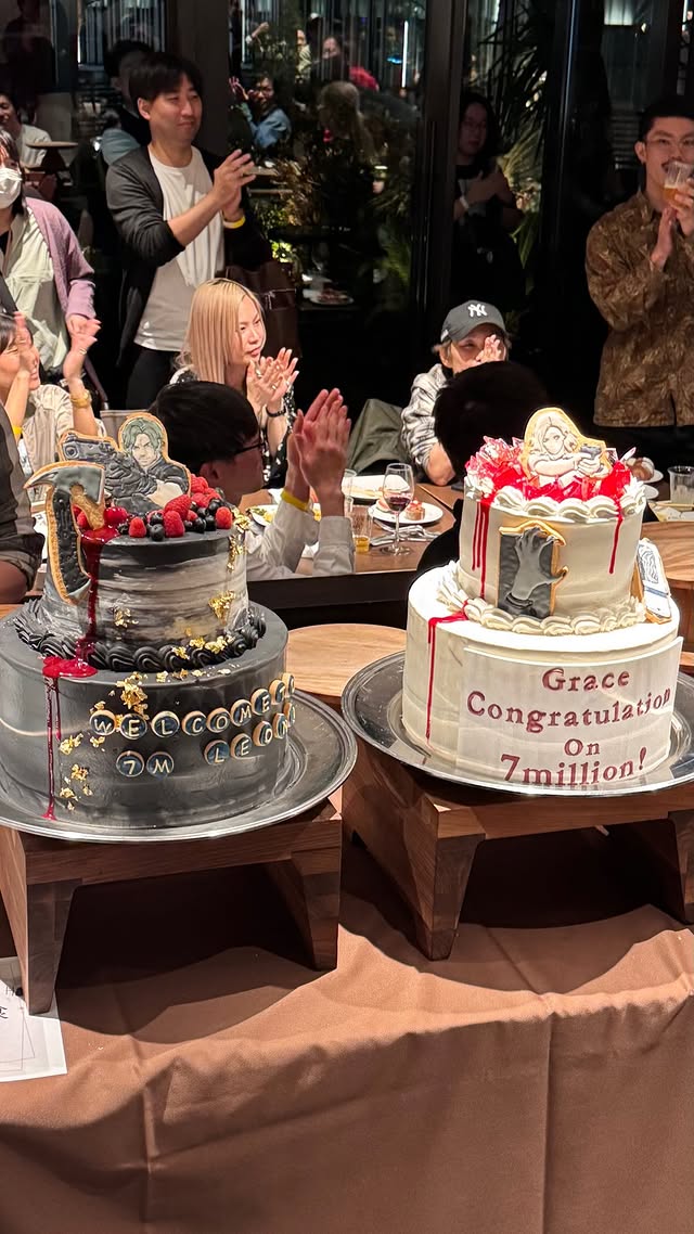 A pair of celebratory, Resident Evil Requiem-themed cakes at a Capcom party celebrating 7 million sales.