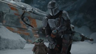 Pedro Pascal and Grogu in The Mandalorian on Disney+.