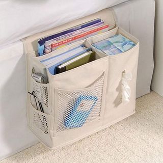 Beside storage caddy with tissues and books