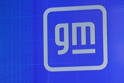 GM, or General Motors logo, in blue displayed on screen
