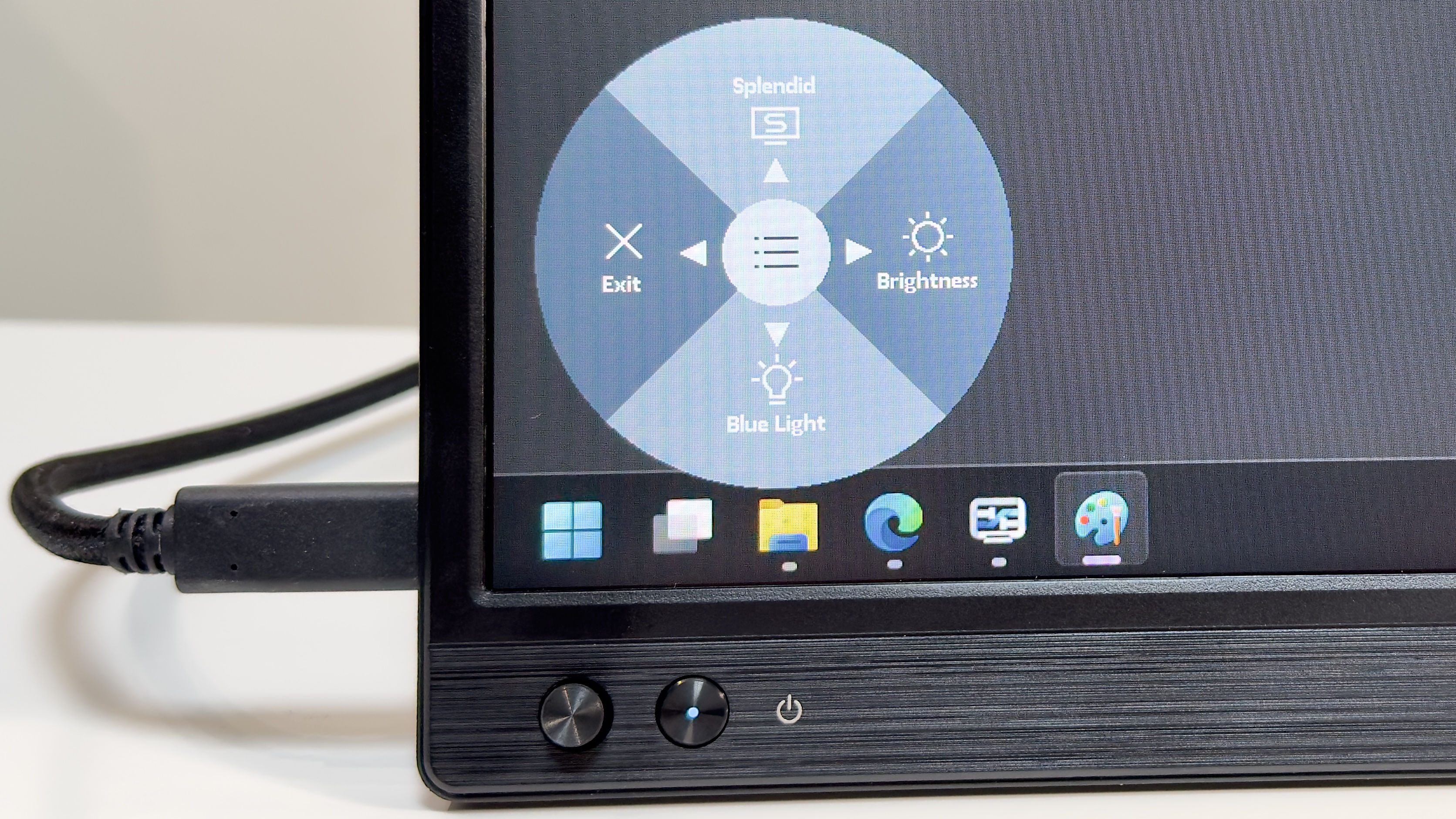 The Asus ZenScreen MB169CK on a desk