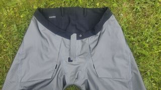 Shorts at front turned inside out, on grass