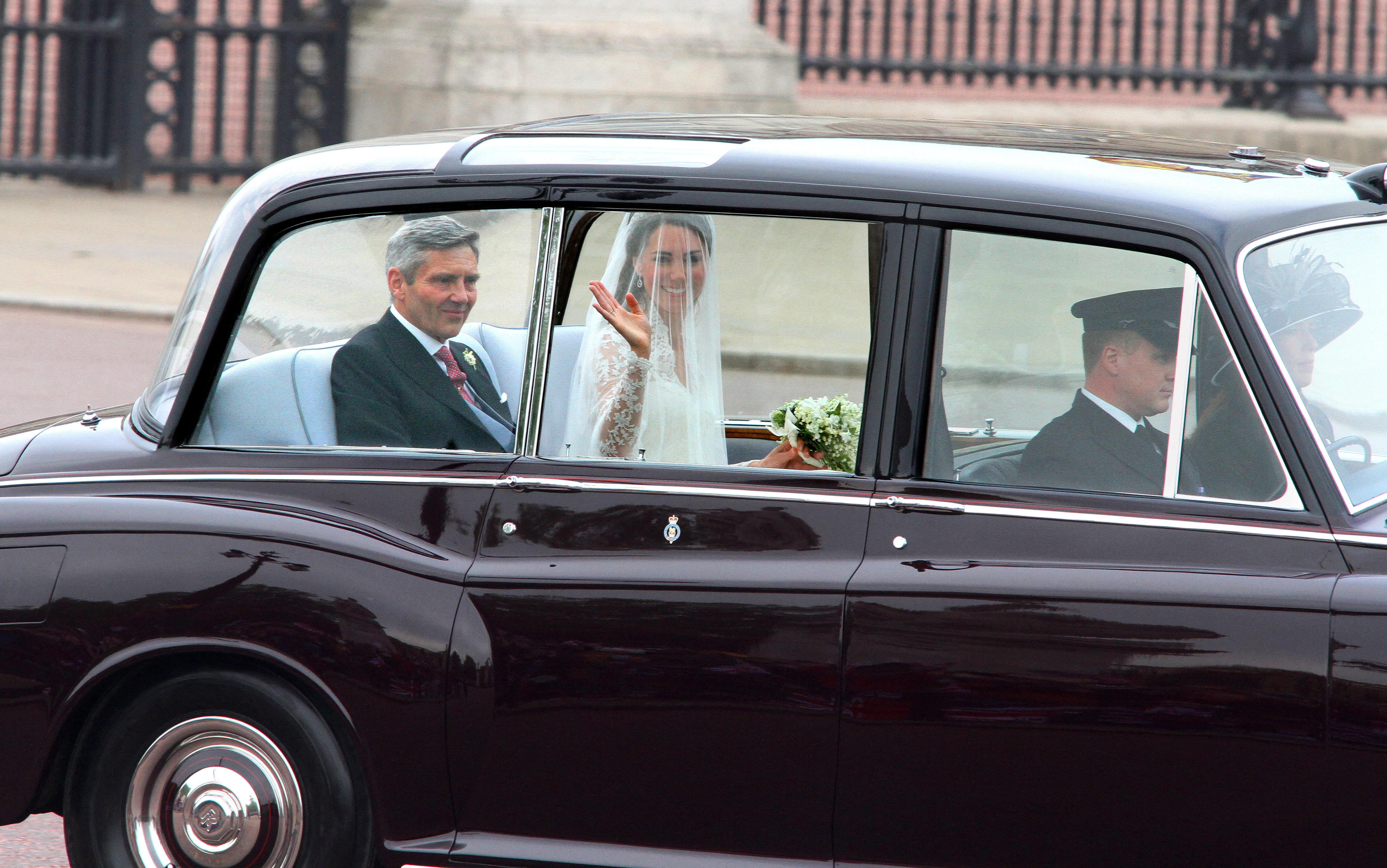 Kate Middleton travels in a Rolls Royce Phantom VI, accompanied by her father Michael Middleton to Westminster Abbey in London for her wedding to Britain's Prince William, on April 29, 2011