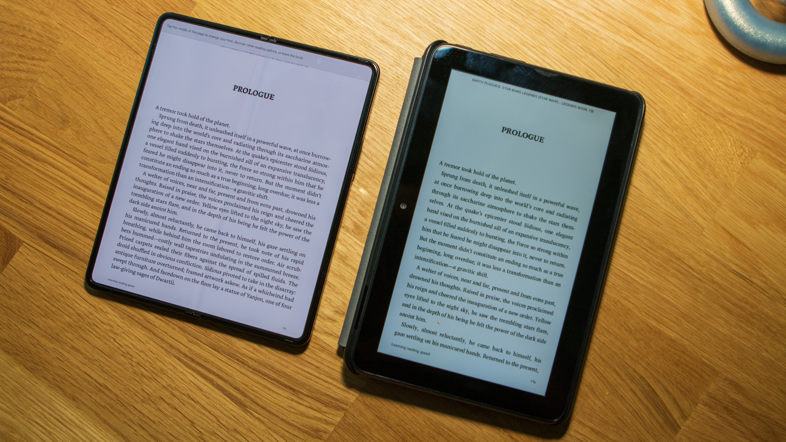 Amazon Fire 7 (2022) next to Galaxy Z Fold 3 with Kindle app