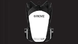 Proviz REFLECT360 Running Backpack in the dark with the main back panel illuminated