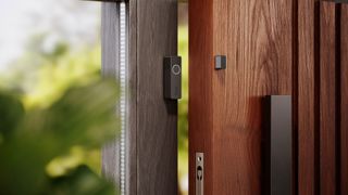 Philips Hue Secure Contact Sensor fitted to a door