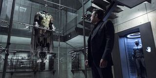 Bruce Wayne looking at Robin costume in Batman v Superman