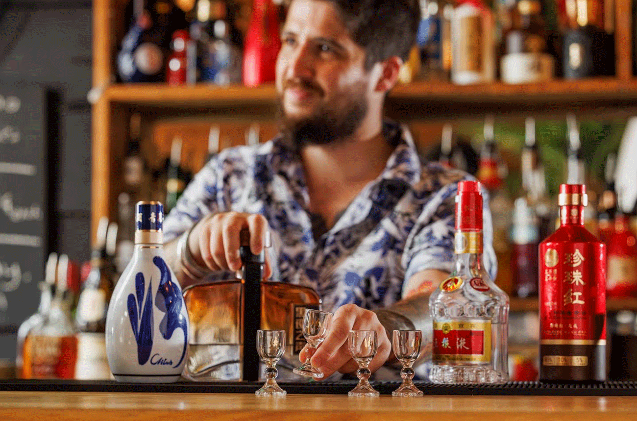 Ben Salguero serving baijiu at Jaded Dragon bar in Bristol