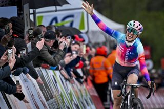 Poland's Katarzyna Niewiadoma of CANYON//SRAM Racing celebrates as she crosses the finish line to win the women's race of "La Fleche Wallonne" cycling race, in Huy on April 17, 2024. (Photo by ERIC LALMAND / Belga / AFP) / Belgium OUT