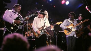 B.B. King (1925-2015), Stevie Ray Vaughan (1954-1990) and Albert Collins (1932-1993) perform together on stage on the riverboat SS President in New Orleans during the New Orleans Jazz & Heritage Festival on 22 April 1988.