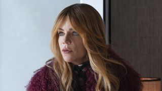 Morgan in magenta furry coat staring worriedly in High Potential Season 2 "NPC"